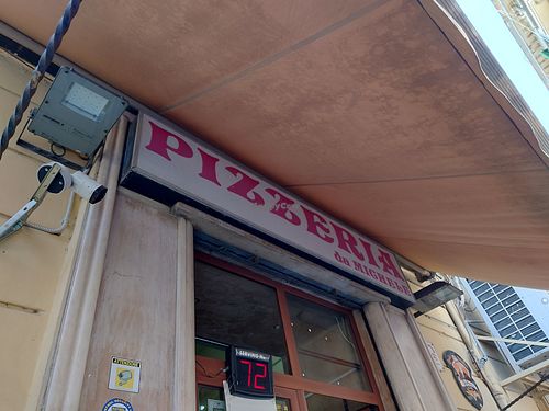 The number on the display is for sitting, on the right side of it is the line to take away! at Pizzeria da Michele in Naples