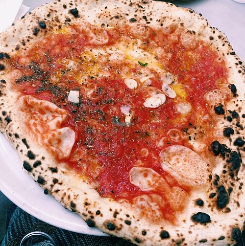 Delicious pizza marinara! at Pizzeria da Michele in Naples