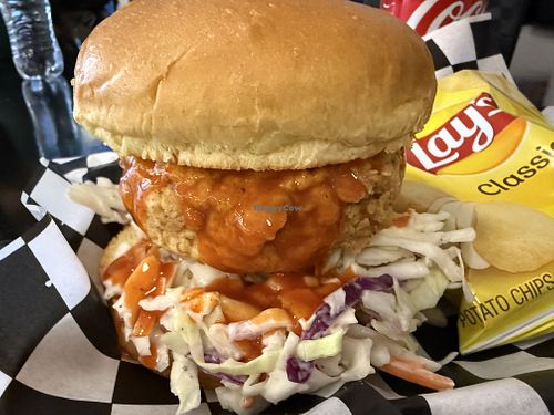 “Chicken” sandwich with buffalo sauce and cole slaw salad 🤩  at Not Ya Mama's Vegan Cafe in Salem