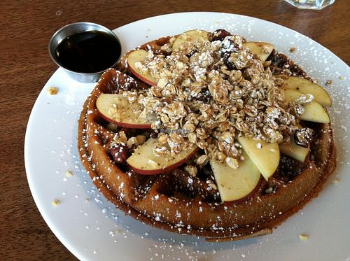 Amazing! Blue corn waffle with walnuts and apples, plus the house-made granola! All vegan! at A N D Cafe in Portland