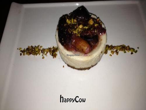cheesecake with black mission figs, white port reduction, and pistachio at Vedge in Philadelphia