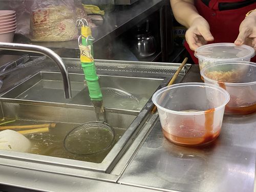 Cooking mee pok dry  at Zhen Xin Vegetarian 真心素食 in Northeast Singapore