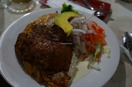 Tacu tacu with steak. at Loving Hut Lince in Lima
