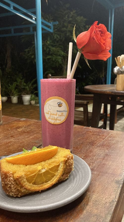Orange cake with a custom smoothie (banana, dragonfruit and peanut butter) they will make custom ones if you ask nicely😇  at Chickpea Eatery Thuan Chay in Hoi An