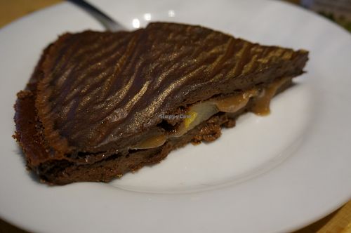 Chocolate pear cake with chestnut filling. at Vegan Folie's in Paris