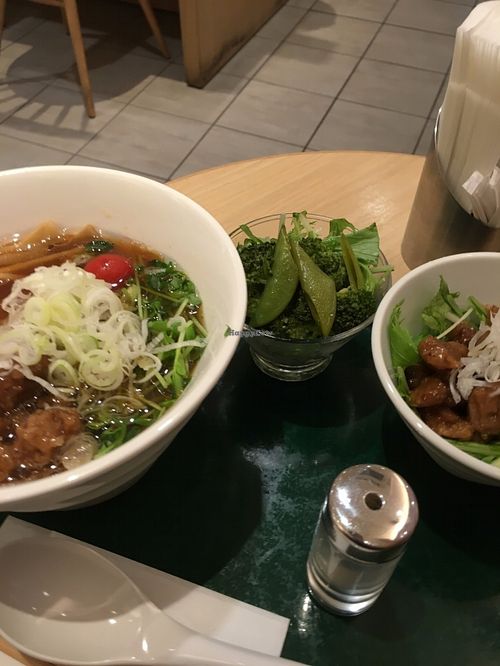Bamboo shoot ramen with side of faux meat and pickled veggies at T's Tantan - Tokyo JR Station in Tokyo