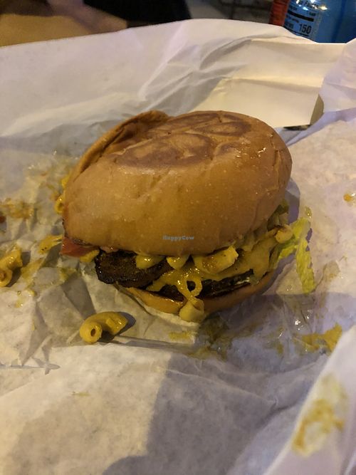 Bacon Mac and cheese burger ready to be annihilated  at Arlo's Food Truck - Cheerup Charlie's in Austin