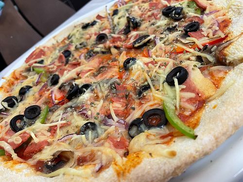 Bacon pizza at Poke & Pizza House in Lisbon