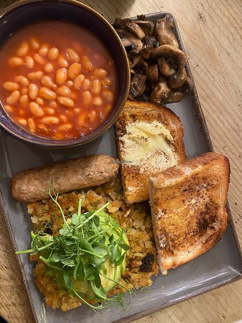 Vegan Hash with beans, toast, mushrooms, avocado, and vegan sausage at Cafe Luna in Baldock