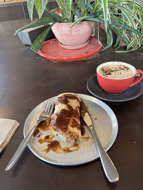 Vegan roll and almond cappuccino   at The Pie Tin in Newtown