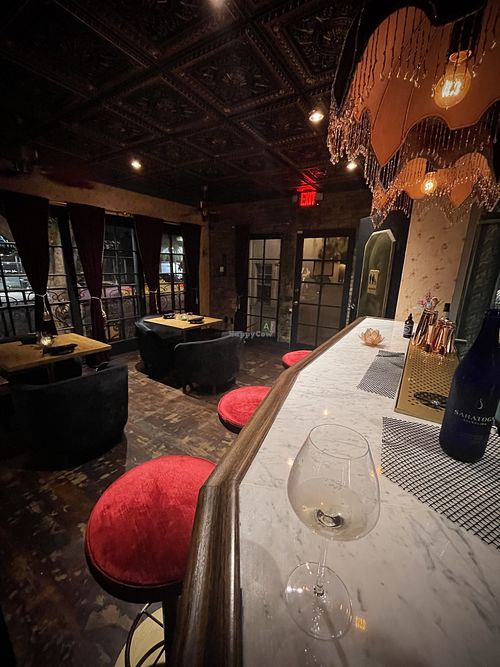 POSH interior.  Look at the stamped tin ceiling.    at Avant Garden Bistro in Los Angeles