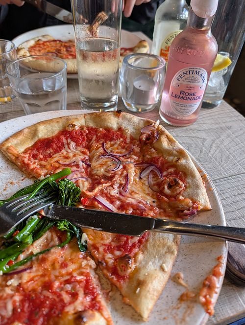 Pizza with a side of chilli and garlic tenderstem broccoli at Ego at The Grapes in Shrewsbury