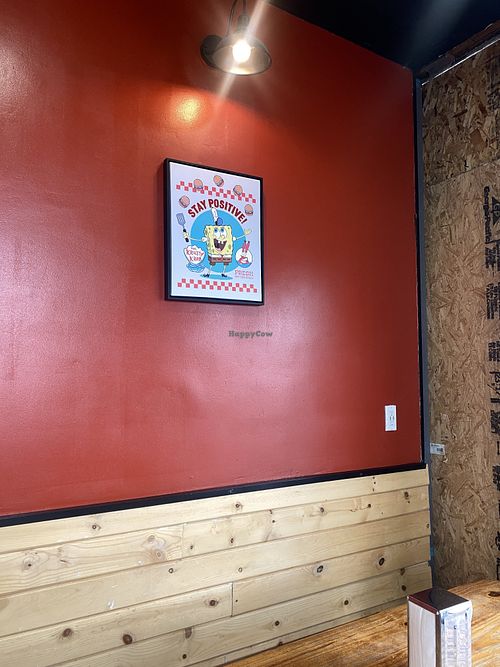 Cute Interior with Booth Seating and Stools Facing Window - It’s Cozy (Small).  at Nice Burger in Long Beach