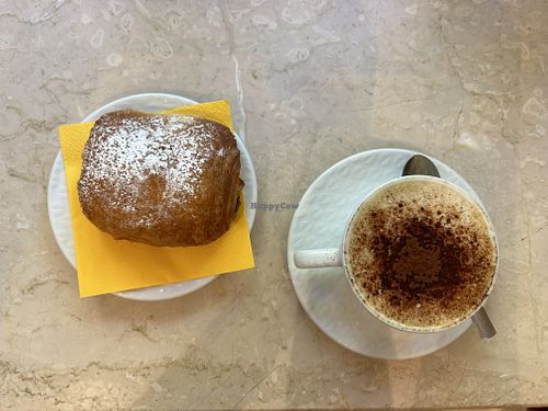 Soy cappuccino and vegan pan au chocolat  at La Dolceria in Rosate