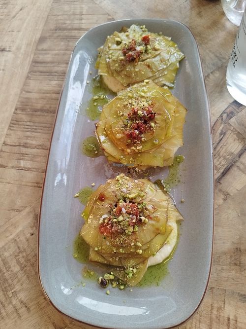 Artichoke Flowers with cashew cream, sundried tomatoes and pesto drizzle at Velada in Barcelona