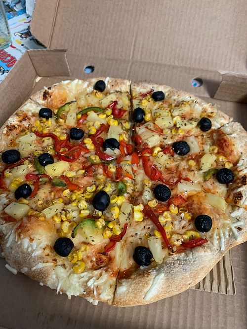 Vegan pizza with veg and pineapple   at Pizza Hut in Sao Miguel