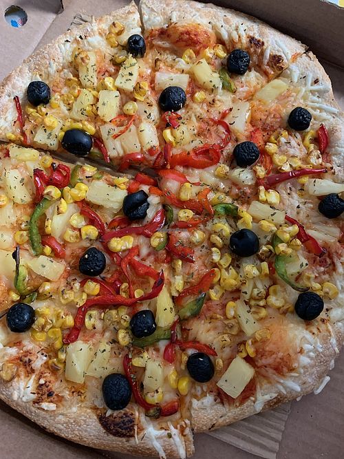 Vegan pizza with veg and pineapple   at Pizza Hut in Sao Miguel