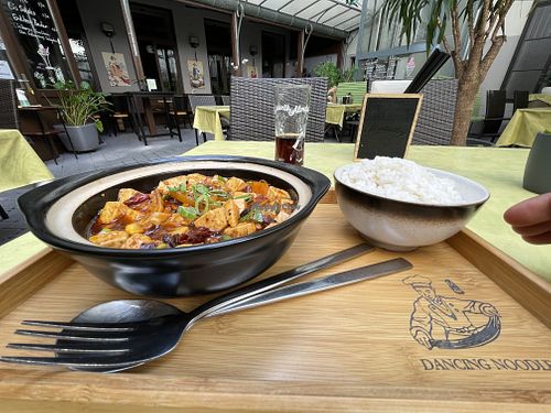 Mapo tofu + rice and the view from the patio  at Dancing Noodles in Vienna