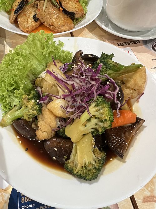 Stir fried broccoli with mushrooms  at Zuya Vegetarian 竹雅素食 - Marina Square in Central Singapore