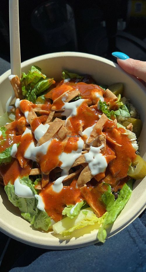 Build your own grain bowl with harissa sauce and garlic sauce   at CAVA in Ramsey