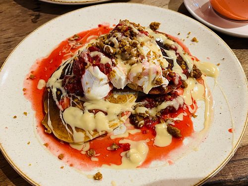 Vegan Raspberry white chocolate pancakes   at Second Home Studio + Cafe in Aberdeen