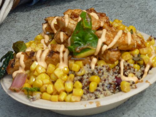 Bowl with beans & quinoa, BarBQ chicken, corn drizzled with cheesy sauce at Southern Fried Vegan BBQ in Los Angeles