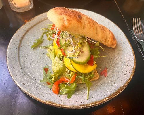 Vegan broodje met o.a. ingelegde groente en Muhammara. at Hofje zonder zorgen in Haarlem