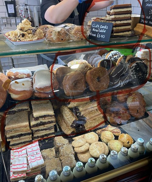 Those circled in red I was shown to be vegan. This is only half the cabinet   at Grace's Bakery in Yarmouth