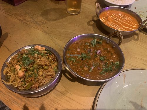(Left to right) veggie biryani, chana masala & butter ‘chicken'  at Namaste Village Cambridge in Cambridge