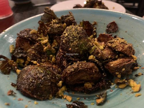 Brussel sprouts with pistachios, vinegar, and maple syrup  at Down Island Gulf Seafood Restaurant in Santa Rosa Beach