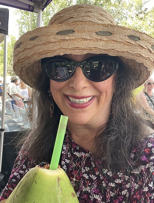 Me enjoying a coconut water while waiting for my cookie    at The Crazy Apron in Clermont