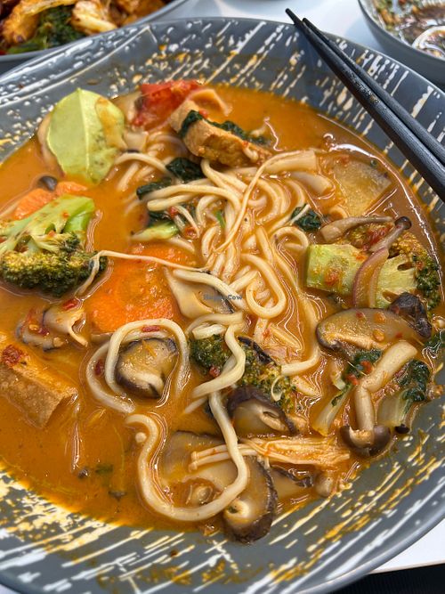 Tom yum ramen  at iVegan 爱素 - Katong in Central Singapore