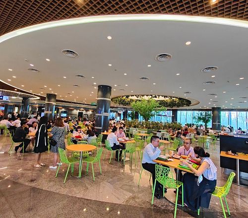 Dining area at Greendot 绿一点 - Asia Square in Central Singapore