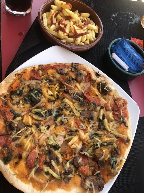 Vegan pizza and hot chips   at Can Paco in Blanes