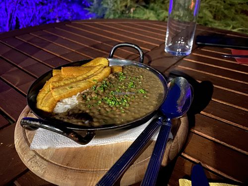 Cacerola EBRO de lentejas y arroz mit grünen Bananen  at Felsengartl Tapas-Heurigen in Emmersdorf An Der Donau