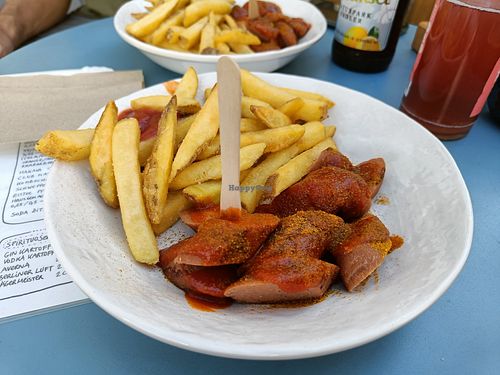 Curry Wurst + Fries at Eh Wurst Vegane Würstelbar in Vienna