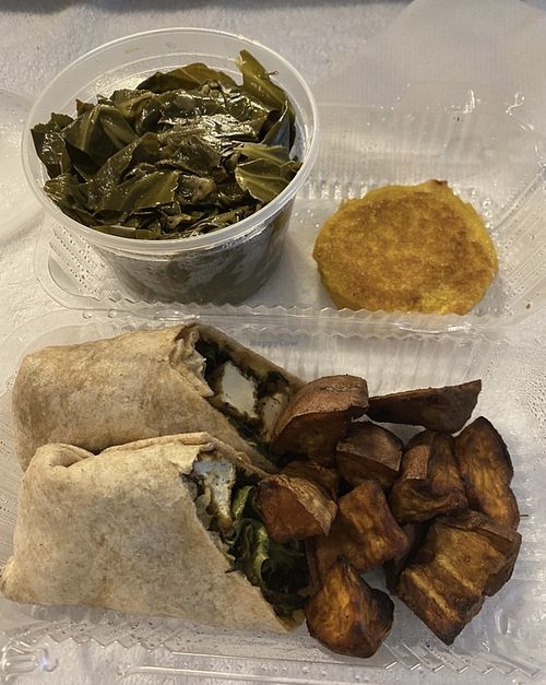 Jerk Tofu Wrap, roasted sweet potatoes, greens and cornbread   at Majani in Chicago