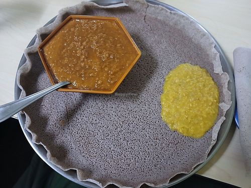 Misir Wot: red lentils w/ deep-cooked red onions, mixed w/ Ethiopian spices in a berbere sauce, & a bonus sampling of Kik Alicha at Jebena Cafe in Seattle