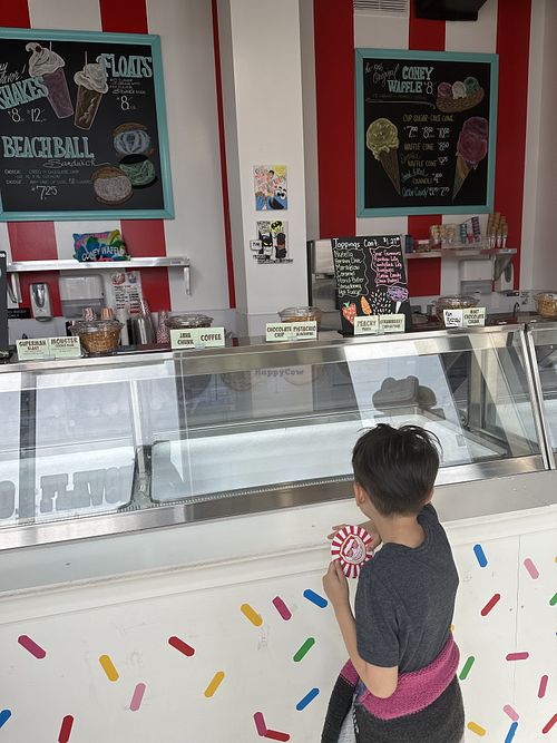 My son looking at the non vegan cones  at Coney Waffle in Brooklyn