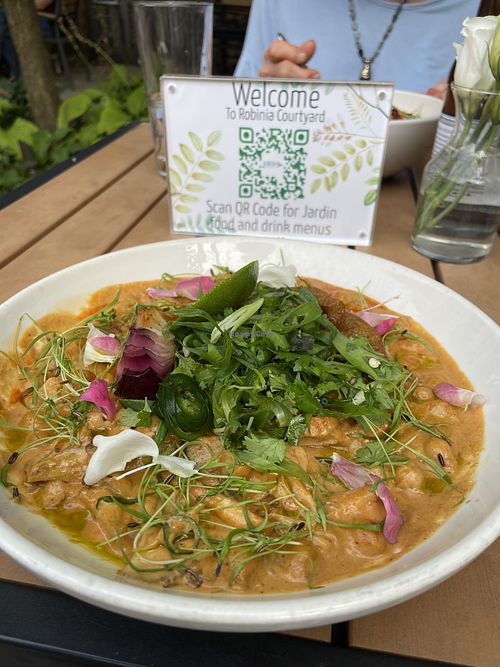 . $22
CHICKPEA CURRY
kabocha squash, shiitake mushroom, blue potato, caramelized sweet onion, fried green tomato, cilantro slaw. One of my delicious favorites.￼  at Jardin in Madison