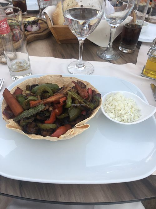 Vegan fajitas (mushrooms, peppers, onions) in a crispy wrap with rice  at Kastro 1380 in Parga