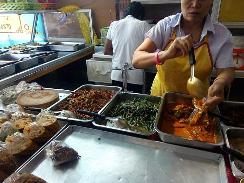 serving breakup at Mae Orathai Vegetarian in Phuket