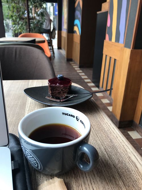 Chocolate mousse vegan cake and Chemex coffee  at Tucano Coffee Costa Rica in Chisinau