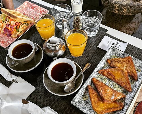 Hummus Toast & Vegan French Toast at Caffè dell'Arte Specialty Coffee in Cagliari