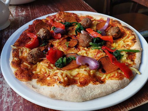 Pizza Vegetariana mad vegan plus adding vegan meatballs and vegan pepperoni at Bella Italia - St Martins Lane in London