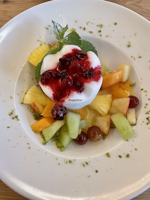 Half board desert: lemon sorbet with fruit salad  at Hotel Klausen Pass in Unterschaechen