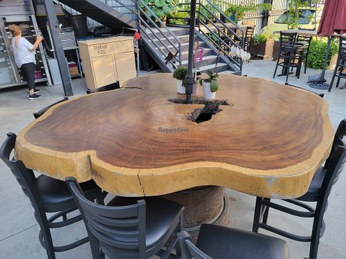 Wooden table at La Flor Original Bistro Vegetariano in Tijuana