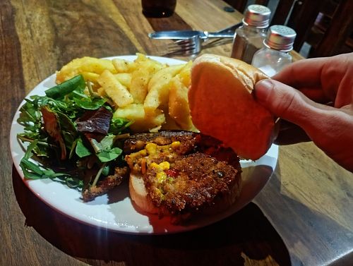 Vegan burger, Tues and Thurs 6pm-9. Good plateful with a drink for £10. Couldn't name the burger, they might make it themselves. Corn, peas, crunchy batter. Good value! at The Black Bull in Gateshead