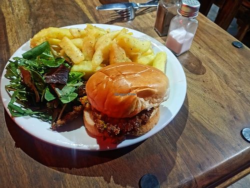 Vegan burger, Tues and Thurs 6pm-9. Good plateful with a drink for £10. Couldn't name the burger, they might make it themselves. Corn, peas, crunchy batter. Good value! at The Black Bull in Gateshead