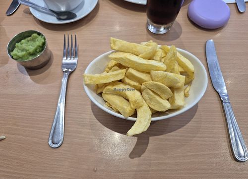Not very impressed  not even on a plate, 2 side dishes. at The Dolphin Restaurant in Ilfracombe
